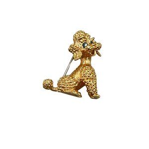 Vintage Krementz Poodle Dog Brooch Gold Tone Metal with Blue Rhinestone Eyes